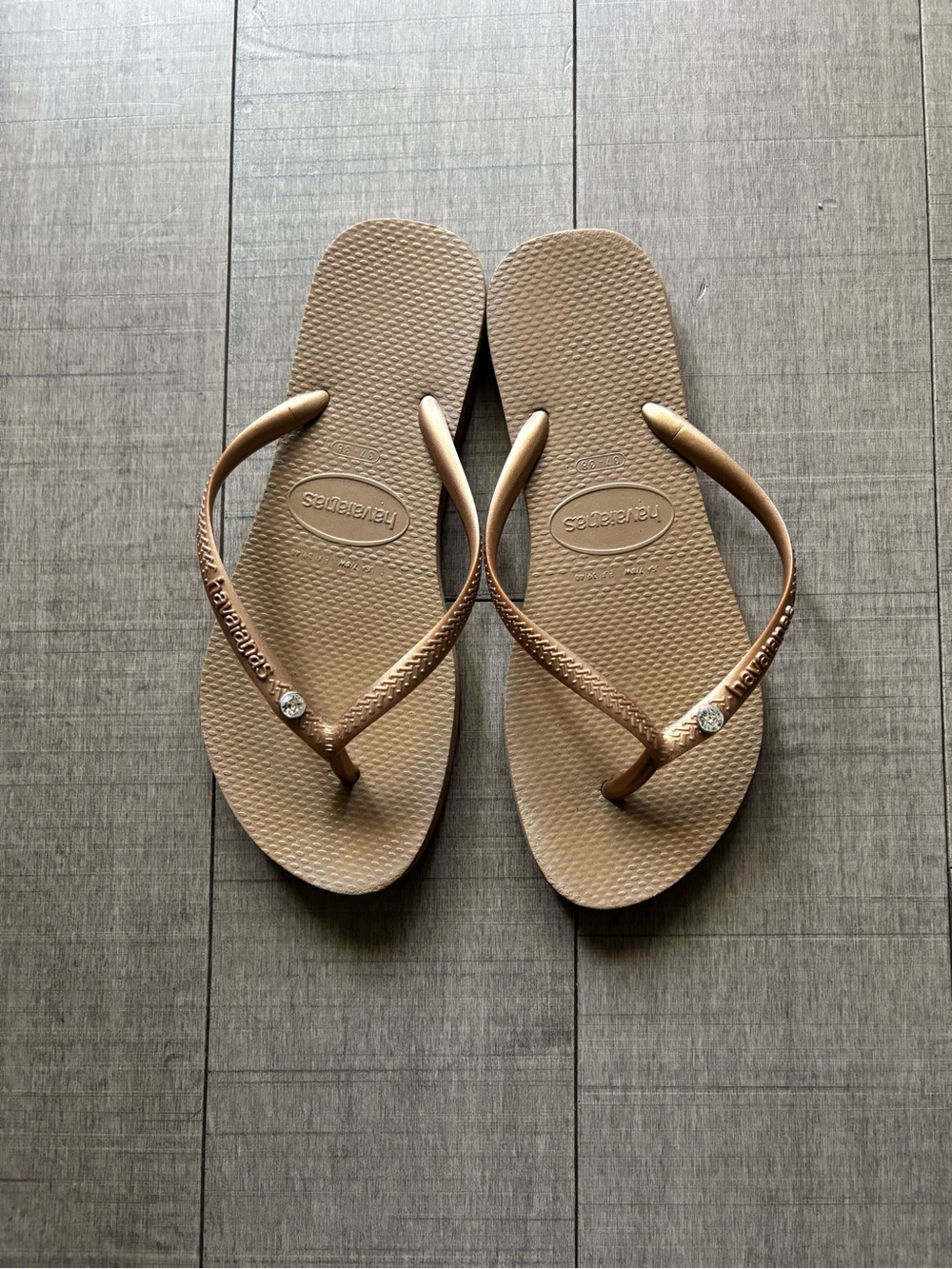 4 for &30- Havaianas Women’s Slim Flip Flops in Metallic Bronze